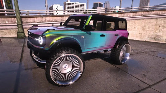 Ford Bronco on Forgiatos Tv's in head rest | PNUT Customs