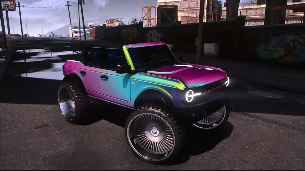 Ford Bronco on Forgiatos Tv's in head rest | PNUT Customs