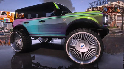 Ford Bronco on Forgiatos Tv's in head rest | PNUT Customs